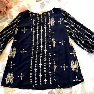 Navy Aztec print blouse.